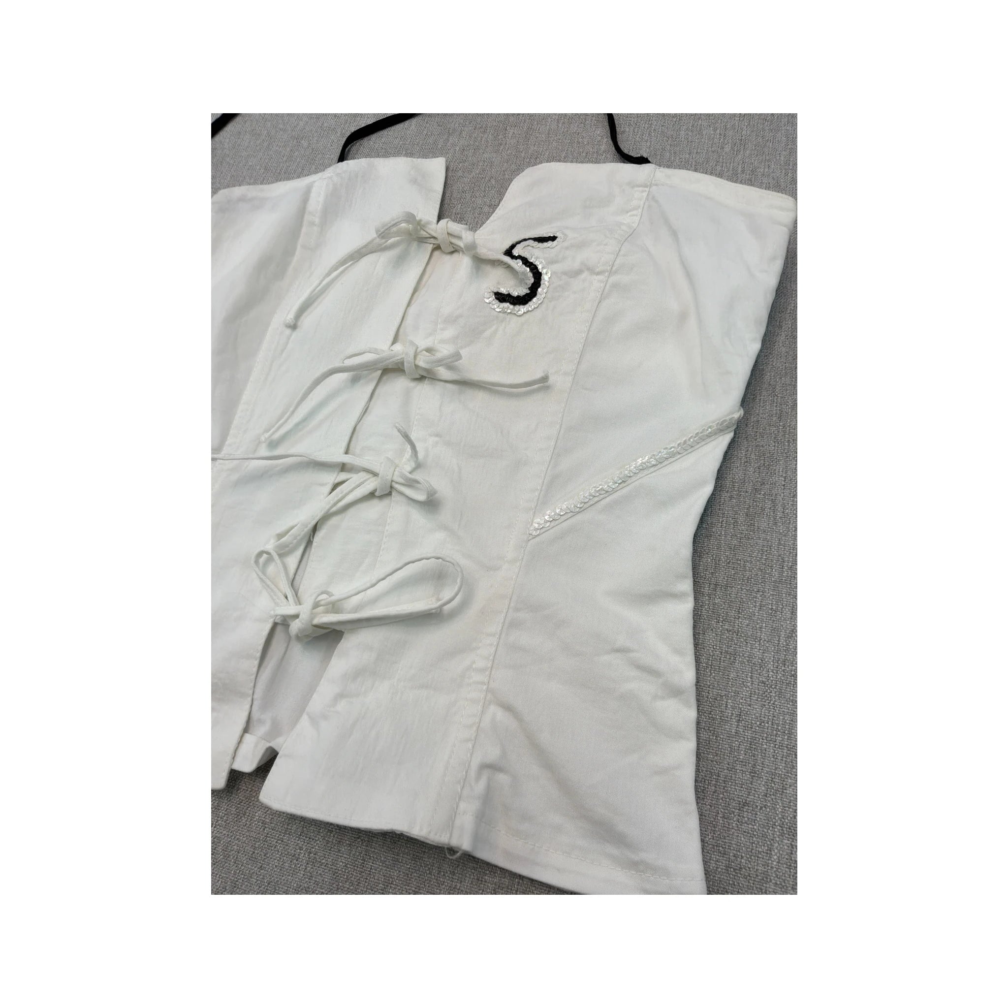 White Corset Top with Black Striped Trim and Lace-Up Detail