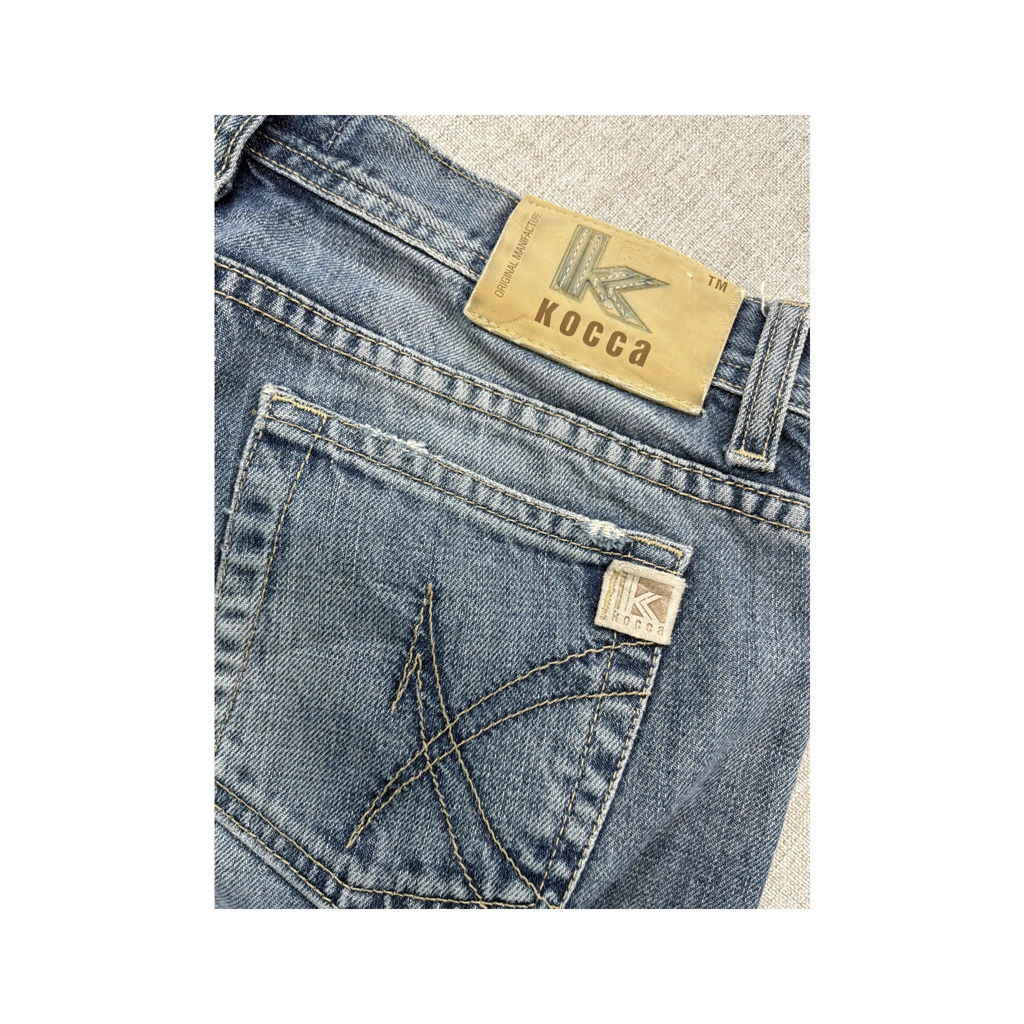 Calças de ganga Bootcut Kocca de Lavagem Desbotada