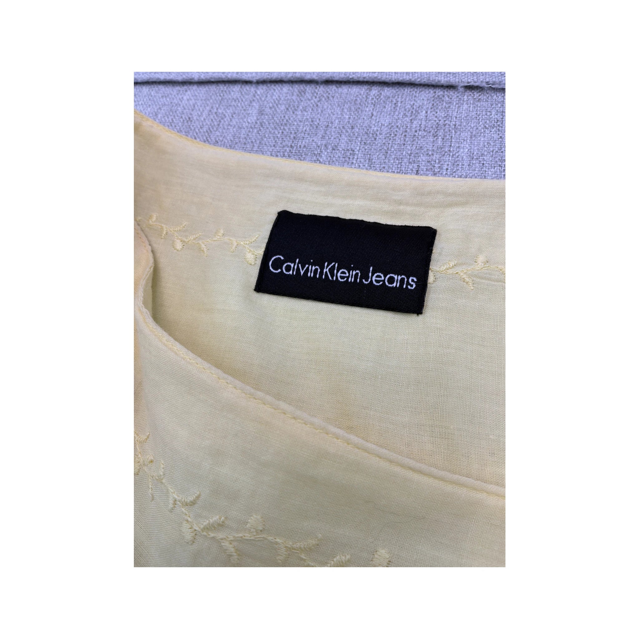Saia Calvin Klein Jeans em algodão amarelo em Camadas com Ilhós