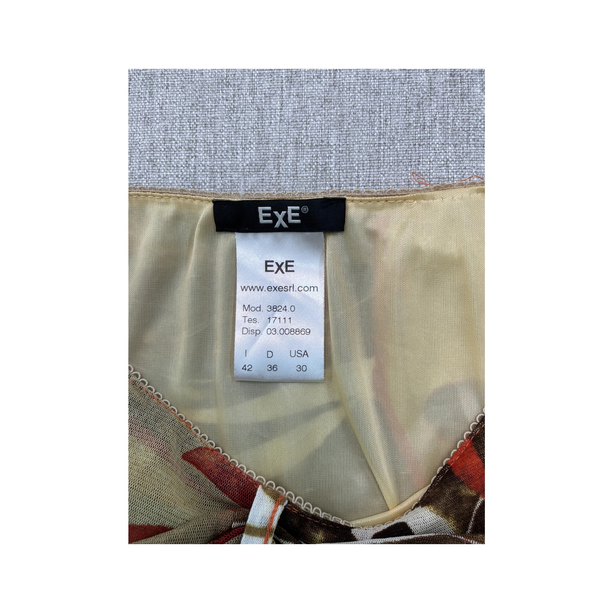 Saia Transparente EXE Assimétrica em Rede floral