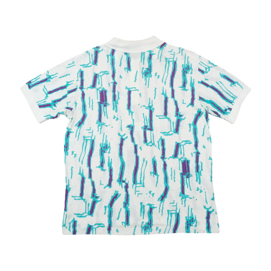 Polo FILA com Estampa Total Abstrata