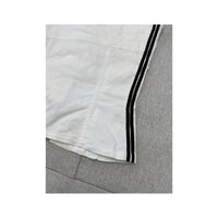 White Corset Top with Black Striped Trim and Lace-Up Detail