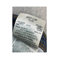 Calças de ganga Wrangler em algodão Elástico de Lavagem média de perna direita