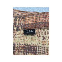 C.Ria Abstract Print Ruffle Hem Cropped Pants