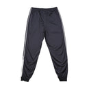 Calças de fato de treino adidas com Três riscas